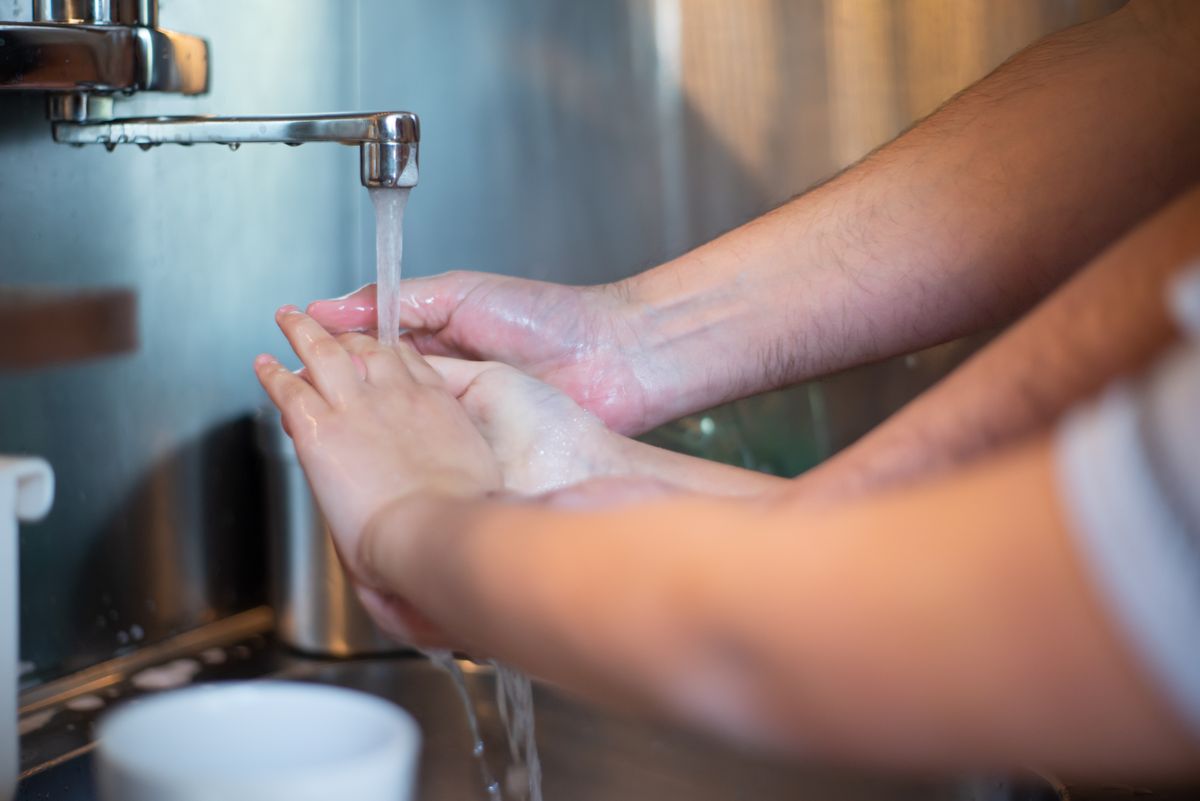 Washing hands at the kitchen sink with soft, scale-free water in a Jacksonville home